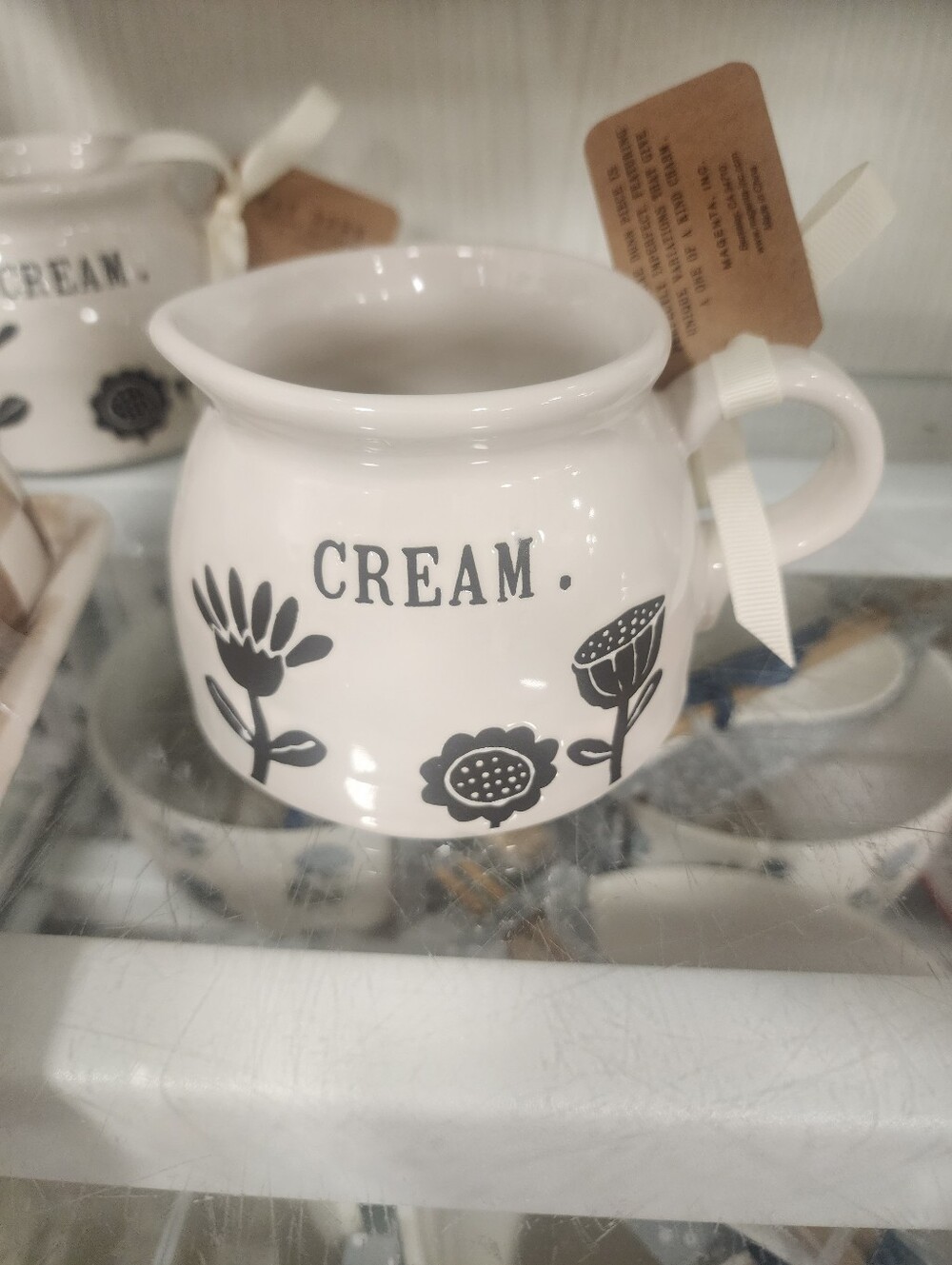 Rae Dunn Cream Ceramic Creamer with Black Floral Design